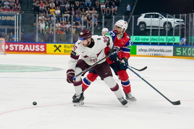 FRIBOURG, SWITZERLAND - MAY 28: Oskars Batna of Latvia L) against Andreas Martinsen of Norway R) during the 2026 IIHF Ice hockey, Eishockey World Championship, WM, Weltmeisterschaft Switzerland game between Norway and Latvia at BCF Arena on May 28, 2026 in Fribourg, Fribourg. Fribourg BCF Arena Fribourg Switzerland Copyright: xJustPictures.ch JarixPestelaccix jp-en-EuSpIm-JP6_JAR_Norway_Latvia_28May2026_00070
