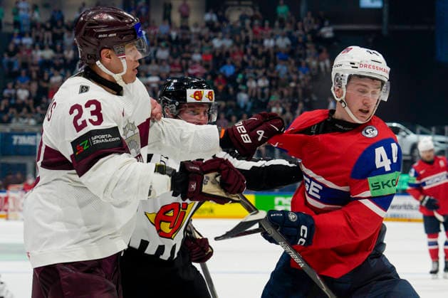 FRIBOURG, SWITZERLAND - MAY 28: Sandis Vilmanis of Latvia against Tinus Luc Koblar of Norway during the 2026 IIHF Ice hockey, Eishockey World Championship, WM, Weltmeisterschaft Switzerland game between Norway and Latvia at BCF Arena on May 28, 2026 in Fribourg, Fribourg. Fribourg BCF Arena Fribourg Switzerland Copyright: xJustPictures.ch JarixPestelaccix jp-en-EuSpIm-JP6_JAR_Norway_Latvia_28May2026_00084