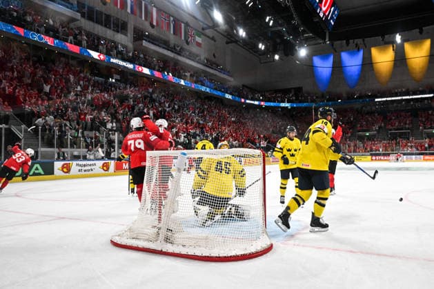 ZURICH, SWITZERLAND - MAY 28: Calvin Thurkauf of Switzerland L) celebrate after scoring a goal against goalkeeper Magnus Hellberg of Sweden during the 2026 IIHF Ice hockey, Eishockey World Championship, WM, Weltmeisterschaft Switzerland game between Switzerland and Sweden at Swiss Life Arena on May 28, 2026 in Zurich, Zurich. Zurich Swiss Life Arena Zurich Switzerland Copyright: xJustPictures.ch AndreaxBrancax jp-en-EuSpIm-JP7_ANB_FinCze_28052026_6015