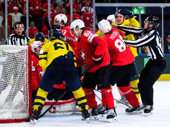 260528 Janis Moser of Switzerland and Jack Berglund of Sweden during the 2026 IIHF Ice hockey, Eishockey World Championship, WM, Weltmeisterschaft quarterfinal match between Switzerland and Sweden on May 28, 2026 in Zürich. Photo: Jesper Zerman BILDBYRAN kod JZ JZ0733 ishockey ice hockey ishockey-vm 2026 vm 2026 iihf world championship kvartsfinal quarterfinal quarterfinals switzerland schweiz sverige sweden bbeng Copyright: JESPERxZERMAN BB260528JZ166