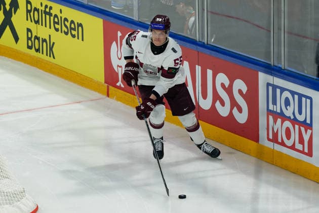 Fribourg, Switzerland - May 28 : Roberts Mamcics of Latvia controls the puck (action) during the 2026 IIHF Ice hockey, Eishockey World Championship, WM, Weltmeisterschaft Switzerland Quarter Final match between Norway and Latvia at BCF Arena on May 28 , 2026 in Fribourg, Switzerland.  Copyright: xGiuseppexVelletrix Sportspressphoto_SPR156407