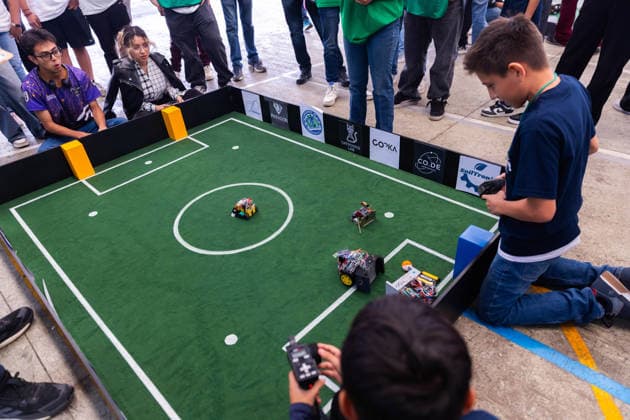 Futbots MX robotic football tournament in Mexico City MEXICO CITY, MEXICO - MAY 28: Participants control robots with remote controls during the Futbots MX robotic tournament, at the School of Mechanical and Electrical Engineering (ESIME), in Mexico City, Mexico on May 28, 2026. ESIME hosted a regional qualifying round for the national Futbot MX Robotics Cup, a tabletop robotics competition where participants control robots in simulated football matches as part of World Cup year activities. Daniel Cardenas Anadolu Mexico City Mexico. Editorial use only. Please get in touch for any other usage.  Copyright: x2026xAnadoluxDanielxCardenasx