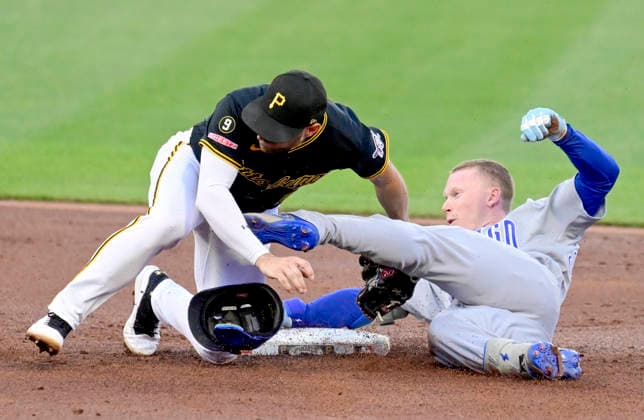 Pittsburgh Pirates second baseman Brandon Lowe (5) tags out Chicago Cubs center fielder Pete Crow-Armstrong (4) attempting to stretch his hit to second base in the third inning against the Chicago Cubs at PNC Park on Thursday, May 28, 2026 in Pittsburgh.  PIT2026052809 ArchiexCarpenter