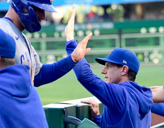 Chicago Cubs manager Craig Counsell (11) greets Chicago Cubs first baseman Michael Busch (29) after scoring in the fourth inning against the Pittsburgh Pirates at PNC Park on Thursday, May 28, 2026 in Pittsburgh.  PIT2026052815 ArchiexCarpenter