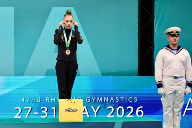 BULGARIA, VARNA - MAY 29, 2026: Silver medalist Sofia Krainska of Ukraine plugs in earphones during a victory ceremony at the 2026 European Rhythmic gymnastics, Rhythmische Sportgymnastik, RSG Championships. Russia s national team, Nationalteam is performing under the Russian flag and anthem Victory Ceremony At 2026 European Rhythmic Gymnastics Championships In Varna, Bulgaria  - ZUMAt113 20260529_zaa_t113_016 Copyright: xIgorxLenkinx