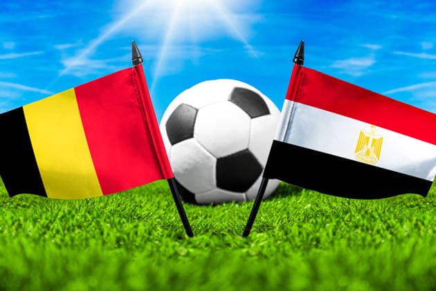May 22, 2026: PHOTO MONTAGE, 2026 FIFA World Cup, WM, Weltmeisterschaft, Fussball National flags of Belgium and Egypt with a soccer ball on the field. Stock image for the group stage match on June 15 at the 2026 FIFA World Cup *** FOTOMONTAGE, Fußball-Weltmeisterschaft 2026: Nationalflaggen von Belgien und Ägypten mit Fußball auf Rasen. Symbolbild zum WM-Gruppenspiel am 15 Juni bei der FIFA Fussball-Weltmeisterschaft 2026
