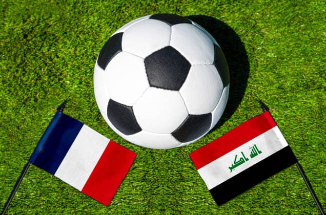 May 22, 2026: PHOTO MONTAGE, 2026 FIFA World Cup, WM, Weltmeisterschaft, Fussball National flags of France and Iraq with a soccer ball on the field. Stock image for the group stage match on June 22 at the 2026 FIFA World Cup *** FOTOMONTAGE, Fußball-Weltmeisterschaft 2026: Nationalflaggen von Frankreich und Irak mit Fußball auf Rasen. Symbolbild zum WM-Gruppenspiel am 22 Juni bei der FIFA Fussball-Weltmeisterschaft 2026