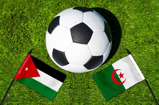 May 22, 2026: PHOTO MONTAGE, 2026 FIFA World Cup, WM, Weltmeisterschaft, Fussball National flags of Jordan and Algeria with a soccer ball on the field. Stock image for the group stage match on June 23 at the 2026 FIFA World Cup *** FOTOMONTAGE, Fußball-Weltmeisterschaft 2026: Nationalflaggen von Jordanien und Algerien mit Fußball auf Rasen. Symbolbild zum WM-Gruppenspiel am 23 Juni bei der FIFA Fussball-Weltmeisterschaft 2026