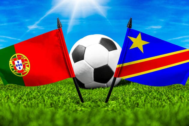 May 22, 2026: PHOTO MONTAGE, 2026 FIFA World Cup, WM, Weltmeisterschaft, Fussball National flags of Portugal and Congo with a soccer ball on the field. Stock image for the group stage match on June 17 at the 2026 FIFA World Cup *** FOTOMONTAGE, Fußball-Weltmeisterschaft 2026: Nationalflaggen von Portugal und Kongo mit Fußball auf Rasen. Symbolbild zum WM-Gruppenspiel am 17 Juni bei der FIFA Fussball-Weltmeisterschaft 2026