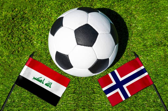 May 22, 2026: PHOTO MONTAGE, 2026 FIFA World Cup, WM, Weltmeisterschaft, Fussball National flags of Iraq and Norway with a soccer ball on the field. Illustrative image for the group stage match on June 17 at the 2026 FIFA World Cup *** FOTOMONTAGE, Fußball-Weltmeisterschaft 2026: Nationalflaggen von Irak und Norwegen mit Fußball auf Rasen. Symbolbild zum WM-Gruppenspiel am 17 Juni bei der FIFA Fussball-Weltmeisterschaft 2026