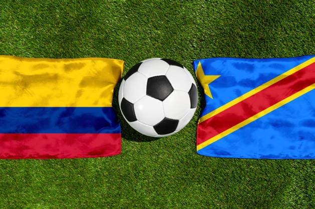 May 22, 2026: PHOTO MONTAGE, 2026 FIFA World Cup, WM, Weltmeisterschaft, Fussball National flags of Colombia and Congo with a soccer ball on the field. Stock image for the group stage match on June 24 at the 2026 FIFA World Cup *** FOTOMONTAGE, Fußball-Weltmeisterschaft 2026: Nationalflaggen von Kolumbien und Kongo mit Fußball auf Rasen. Symbolbild zum WM-Gruppenspiel am 24 Juni bei der FIFA Fussball-Weltmeisterschaft 2026