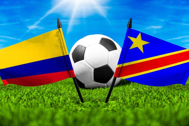 May 22, 2026: PHOTO MONTAGE, 2026 FIFA World Cup, WM, Weltmeisterschaft, Fussball National flags of Colombia and Congo with a soccer ball on the field. Stock image for the group stage match on June 24 at the 2026 FIFA World Cup *** FOTOMONTAGE, Fußball-Weltmeisterschaft 2026: Nationalflaggen von Kolumbien und Kongo mit Fußball auf Rasen. Symbolbild zum WM-Gruppenspiel am 24 Juni bei der FIFA Fussball-Weltmeisterschaft 2026