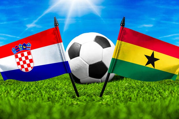 May 22, 2026: PHOTO MONTAGE, 2026 FIFA World Cup, WM, Weltmeisterschaft, Fussball National flags of Croatia and Ghana with a soccer ball on the field. Stock image for the group stage match on June 27 at the 2026 FIFA World Cup *** FOTOMONTAGE, Fußball-Weltmeisterschaft 2026: Nationalflaggen von Kroatien und Ghana mit Fußball auf Rasen. Symbolbild zum WM-Gruppenspiel am 27 Juni bei der FIFA Fussball-Weltmeisterschaft 2026