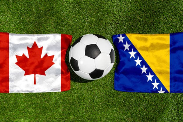 May 22, 2026: PHOTO MONTAGE, 2026 FIFA World Cup, WM, Weltmeisterschaft, Fussball National flags of Canada and Bosnia and Herzegovina with a soccer ball on the field. Illustrative image for the group stage match on June 12 at the 2026 FIFA World Cup *** FOTOMONTAGE, Fußball-Weltmeisterschaft 2026: Nationalflaggen von Kanada und Bosnien Herzegowina mit Fußball auf Rasen. Symbolbild zum WM-Gruppenspiel am 12 Juni bei der FIFA Fussball-Weltmeisterschaft 2026