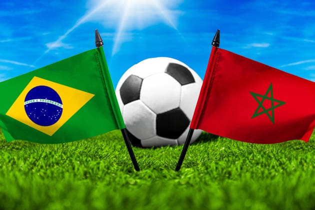 May 22, 2026: PHOTO MONTAGE, 2026 FIFA World Cup, WM, Weltmeisterschaft, Fussball National flags of Brazil and Morocco with a soccer ball on the field. Illustrative image for the group stage match on June 14 at the 2026 FIFA World Cup *** FOTOMONTAGE, Fußball-Weltmeisterschaft 2026: Nationalflaggen von Brasilien und Marokko mit Fußball auf Rasen. Symbolbild zum WM-Gruppenspiel am 14 Juni bei der FIFA Fussball-Weltmeisterschaft 2026