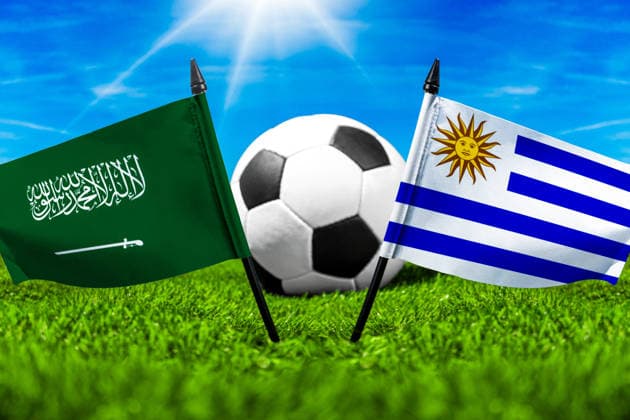 May 22, 2026: PHOTO MONTAGE, 2026 FIFA World Cup, WM, Weltmeisterschaft, Fussball National flags of Saudi Arabia and Uruguay with a soccer ball on the field. Stock image for the group stage match on June 16 at the 2026 FIFA World Cup *** FOTOMONTAGE, Fußball-Weltmeisterschaft 2026: Nationalflaggen von Saudi-Arabien und Uruguay mit Fußball auf Rasen. Symbolbild zum WM-Gruppenspiel am 16 Juni bei der FIFA Fussball-Weltmeisterschaft 2026