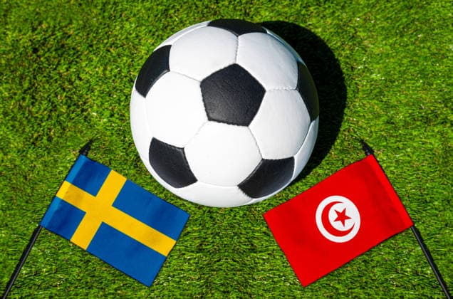 May 22, 2026: PHOTO MONTAGE, 2026 FIFA World Cup, WM, Weltmeisterschaft, Fussball National flags of Sweden and Tunisia with a soccer ball on the field. Illustrative image for the group stage match on June 15 at the 2026 FIFA World Cup *** FOTOMONTAGE, Fußball-Weltmeisterschaft 2026: Nationalflaggen von Schweden und Tunesien mit Fußball auf Rasen. Symbolbild zum WM-Gruppenspiel am 15 Juni bei der FIFA Fussball-Weltmeisterschaft 2026
