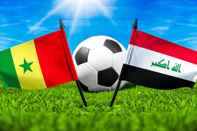May 22, 2026: PHOTO MONTAGE, 2026 FIFA World Cup, WM, Weltmeisterschaft, Fussball National flags of Senegal and Iraq with a soccer ball on the field. Stock image for the group stage match on June 26 at the 2026 FIFA World Cup *** FOTOMONTAGE, Fußball-Weltmeisterschaft 2026: Nationalflaggen von Senegal und Irak mit Fußball auf Rasen. Symbolbild zum WM-Gruppenspiel am 26 Juni bei der FIFA Fussball-Weltmeisterschaft 2026