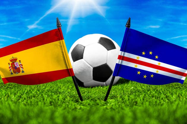 May 22, 2026: PHOTO MONTAGE, 2026 FIFA World Cup, WM, Weltmeisterschaft, Fussball National flags of Spain and Cape Verde with a soccer ball on the grass. Stock image for the group stage match on June 15 at the 2026 FIFA World Cup *** FOTOMONTAGE, Fußball-Weltmeisterschaft 2026: Nationalflaggen von Spanien und Kap Verde mit Fußball auf Rasen. Symbolbild zum WM-Gruppenspiel am 15 Juni bei der FIFA Fussball-Weltmeisterschaft 2026