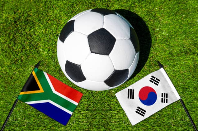 May 22, 2026: PHOTO MONTAGE, 2026 FIFA World Cup, WM, Weltmeisterschaft, Fussball National flags of South Africa and South Korea with a soccer ball on a field. Stock image for the group stage match on June 25 at the 2026 FIFA World Cup *** FOTOMONTAGE, Fußball-Weltmeisterschaft 2026: Nationalflaggen von Südafrika und Südkorea mit Fußball auf Rasen. Symbolbild zum WM-Gruppenspiel am 25 Juni bei der FIFA Fussball-Weltmeisterschaft 2026