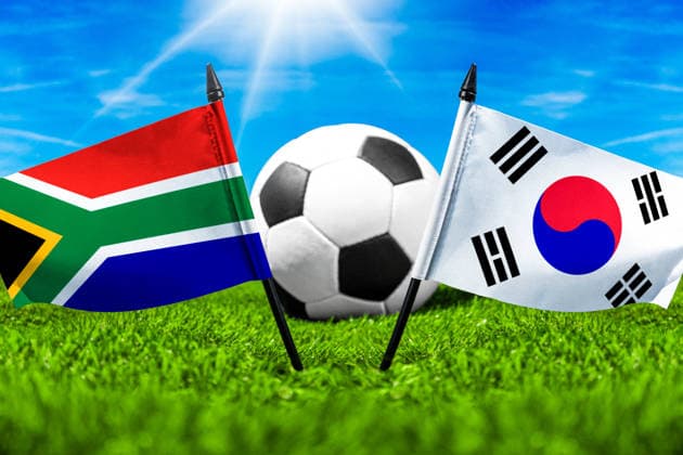 May 22, 2026: PHOTO MONTAGE, 2026 FIFA World Cup, WM, Weltmeisterschaft, Fussball National flags of South Africa and South Korea with a soccer ball on a field. Stock image for the group stage match on June 25 at the 2026 FIFA World Cup *** FOTOMONTAGE, Fußball-Weltmeisterschaft 2026: Nationalflaggen von Südafrika und Südkorea mit Fußball auf Rasen. Symbolbild zum WM-Gruppenspiel am 25 Juni bei der FIFA Fussball-Weltmeisterschaft 2026