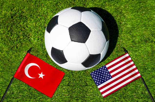 May 22, 2026: PHOTO MONTAGE, 2026 FIFA World Cup, WM, Weltmeisterschaft, Fussball National flags of Turkey and the U.S. with a soccer ball on the field. Stock image for the group stage match on June 26 at the 2026 FIFA World Cup *** FOTOMONTAGE, Fußball-Weltmeisterschaft 2026: Nationalflaggen von Türkei und USA mit Fußball auf Rasen. Symbolbild zum WM-Gruppenspiel am 26 Juni bei der FIFA Fussball-Weltmeisterschaft 2026