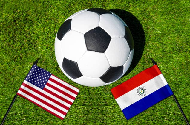 May 22, 2026: PHOTO MONTAGE, 2026 FIFA World Cup, WM, Weltmeisterschaft, Fussball National flags of the USA and Paraguay with a soccer ball on the field. Stock image for the group stage match on June 12 at the 2026 FIFA World Cup *** FOTOMONTAGE, Fußball-Weltmeisterschaft 2026: Nationalflaggen von USA und Paraguay mit Fußball auf Rasen. Symbolbild zum WM-Gruppenspiel am 12 Juni bei der FIFA Fussball-Weltmeisterschaft 2026