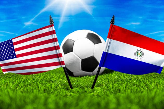 May 22, 2026: PHOTO MONTAGE, 2026 FIFA World Cup, WM, Weltmeisterschaft, Fussball National flags of the USA and Paraguay with a soccer ball on the field. Stock image for the group stage match on June 12 at the 2026 FIFA World Cup *** FOTOMONTAGE, Fußball-Weltmeisterschaft 2026: Nationalflaggen von USA und Paraguay mit Fußball auf Rasen. Symbolbild zum WM-Gruppenspiel am 12 Juni bei der FIFA Fussball-Weltmeisterschaft 2026