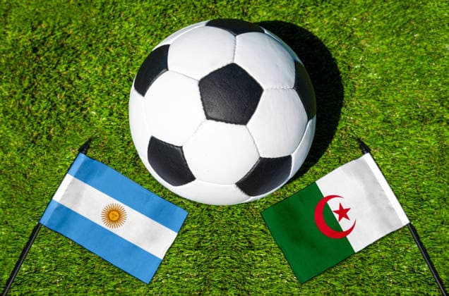 May 22, 2026: PHOTO MONTAGE, 2026 FIFA World Cup, WM, Weltmeisterschaft, Fussball National flags of Argentina and Algeria with a soccer ball on the field. Stock image for the group stage match on June 17 at the 2026 FIFA World Cup *** FOTOMONTAGE, Fußball-Weltmeisterschaft 2026: Nationalflaggen von Argentinien und Algerien mit Fußball auf Rasen. Symbolbild zum WM-Gruppenspiel am 17 Juni bei der FIFA Fussball-Weltmeisterschaft 2026