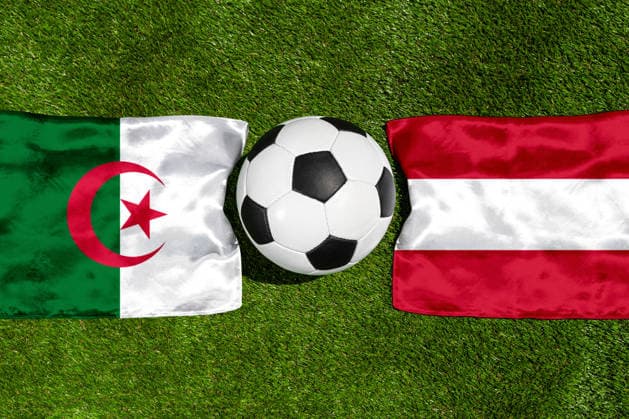 May 22, 2026: PHOTO MONTAGE, 2026 FIFA World Cup, WM, Weltmeisterschaft, Fussball National flags of Algeria and Austria with a soccer ball on the field. Stock image for the group stage match on June 28 at the 2026 FIFA World Cup *** FOTOMONTAGE, Fußball-Weltmeisterschaft 2026: Nationalflaggen von Algerien und Österreich mit Fußball auf Rasen. Symbolbild zum WM-Gruppenspiel am 28 Juni bei der FIFA Fussball-Weltmeisterschaft 2026
