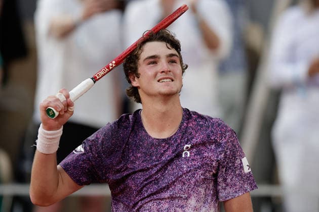French Open - Joa Fonseca beams with joy after his win over Novak Djokovic during at the 2026 Roland-Garros tournament in Paris, FRANCE, on May 29 - 2026 Copyright: AntonioxBorga