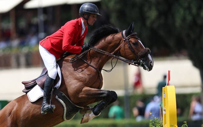 (260530) -- ROME, May 30, 2026 -- Christian Ahlmann of Germany competes during the nations cup event of equestrian at the 2026 CSIO (Official International Show Jumping Competition) of Rome in Piazza di Siena of Rome, Italy, May 29, 2026. ) (SP)ITALY-ROME-EQUESTRIAN-2026 CSIO-NATIONS CUP WangxKaiyan 