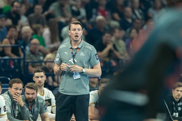 Trainer Filip Jicha (THW Kiel) looks on during the handball semi-final of the the Winamax EHF Finals 2026 between Montpellier Handball and THW Kiel at Barclays Arena on May 30, 2026 in Hamburg, Germany. -