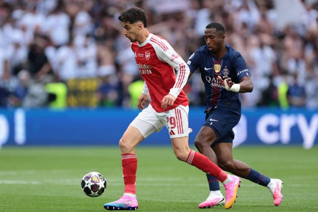 Budapest, Hungary, 30th May 2026. Kai Havertz of Arsenal FC is pursued by Willian Pacho of PSG during the Paris Saint Germain vs Arsenal FC UEFA Champions League Final match at Puskas Arena, Budapest. Picture credit should read: Jonathan Moscrop Sportimage EDITORIAL USE ONLY. No use with unauthorised audio, video, data, fixture lists, club league logos or live services. Online in-match use limited to 120 images, no video emulation. No use in betting, games or single club league player publications. SPI_007_PSG_ARSENAL_UCL SPI-4825-0007
