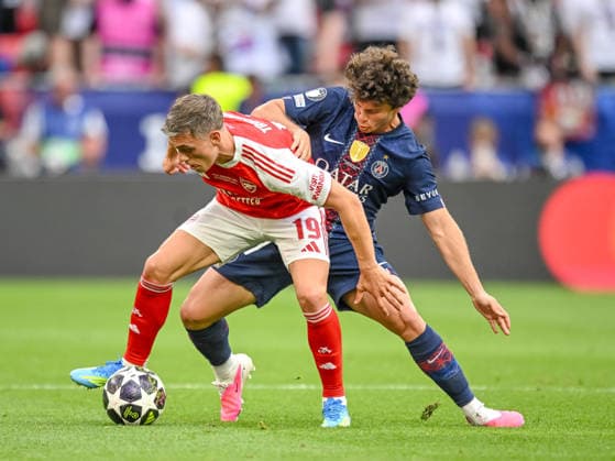 Leandro Trossard (Arsenal FC) and Joao Neves (Paris Saint-Germain FC) battle for the ball during the UEFA Champions League Final 2026 match between Paris Saint-Germain and Arsenal FC at Puskas Arena on May 30, 2026 in Budapest, Hungary. (Photo by Harry Langer DeFodi Images) -