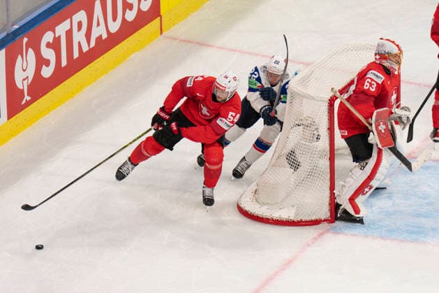 ZURICH, SWITZERLAND - MAY 30: Christian Marti of Switzerland L) against Martin Ronnild of Norway C) during the 2026 IIHF Ice hockey, Eishockey World Championship, WM, Weltmeisterschaft Switzerland game between Switzerland and Norway at Swiss Life Arena on May 30, 2026 in Zurich, Zurich. Zurich Swiss Life Arena Zurich Switzerland Copyright: xJustPictures.ch JarixPestelaccix jp-en-EuSpIm-JP6_JAR_Switzerland_Norway_30May2026_00040