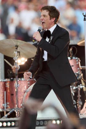 Paris Saint-Germain v Arsenal FC - UEFA Champions League Final 2026 Brandon Flowers lead singer of the Killers performing before the UEFA Champions League Final 2026 match between Paris Saint-Germain and Arsenal FC at Puskas Arena on May 30, 2026 in Budapest, Hungary. WARNING! This Photograph May Only Be Used For Newspaper And Or Magazine Editorial Purposes. May Not Be Used For Publications Involving 1 player, 1 Club Or 1 Competition Without Written Authorisation From Football DataCo Ltd. For Any Queries, Please Contact Football DataCo Ltd on +44 (0) 207 864 9121 Budapest Puskas Arena Hungary Hungary Copyright: xAllstarxPicturexLibraryxLtdx