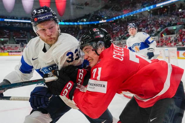 ZURICH, SWITZERLAND - MAY 30: Nikolas Matinpalo of Finland L) against Macklin Celebrini of Canada R) during the 2026 IIHF Ice hockey, Eishockey World Championship, WM, Weltmeisterschaft Switzerland game between Canada and Finland at Swiss Life Arena on May 30, 2026 in Zurich, Zurich. Zurich Swiss Life Arena Zurich Switzerland Copyright: xJustPictures.ch JarixPestelaccix jp-en-EuSpIm-JP6_JAR_Canada_Finland_30May2026_00088