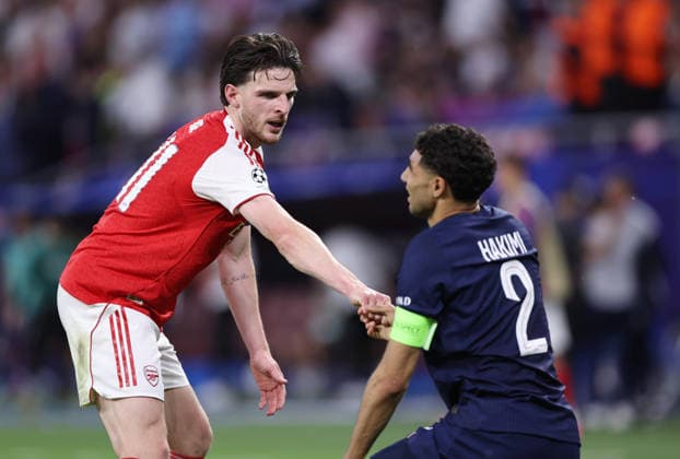 Budapest, Hungary, 30th May 2026. Declan Rice of Arsenal shakes hands with Achraf Hakimi of Paris Saint-Germain after extra time during the Paris Saint Germain vs Arsenal UEFA Champions League Final match at Puskas Arena, Budapest. Picture credit should read: David Klein Sportimage EDITORIAL USE ONLY. No use with unauthorised audio, video, data, fixture lists, club league logos or live services. Online in-match use limited to 120 images, no video emulation. No use in betting, games or single club league player publications. SPI_140_DK_PSG_Arsenal SPI-4828-0139