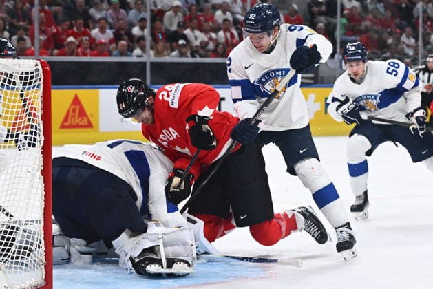 From left goalkeeper Justus Annunen of Finland, Dylan Cozens of Canada and Lenni Hameenaho of Finland in action during the semifinal match Canada vs Finland at the 2026 IIHF Ice hockey, Eishockey World Championship, WM, Weltmeisterschaft on May 30, 2026, Zurich, Switzerland. (CTKxPhoto RadekxPetrasek) CTKPhotoP2026053005687  CTKPhotoP2026053005687