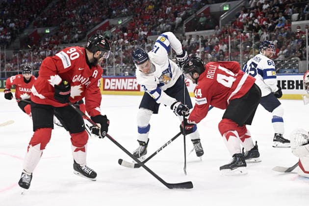 LKS 20260530 13 Jesse Puljujärvi of Finland and 90 Ryan O Reilly and 44 Morgan Rielly during the 2026 IIHF Ice hockey, Eishockey World Championships semi-final match between Canada and Finland in Zurich on May 30, 2026. - RONI REKOMAA Zürich Switzerland OyccRPaM65o  Copyright: xRonixRekomaax OyccRPaM65o