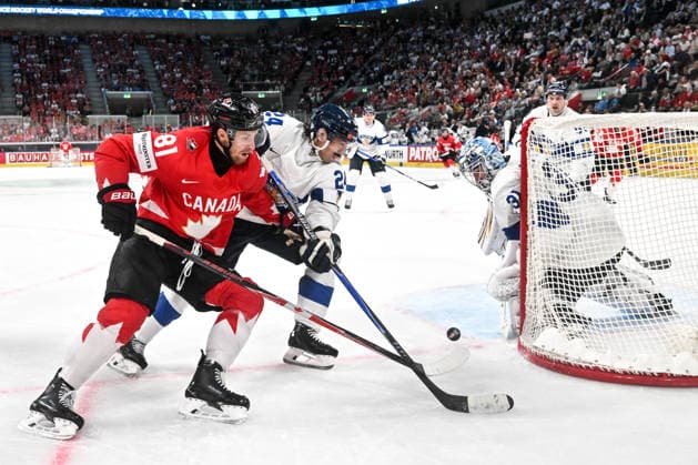 ZURICH, SWITZERLAND - MAY 30: Dylan Holloway of Canada in action against Hannes Bjorninen of Finland L) and goalkeeper Justus Annunen of Finland during the 2026 IIHF Ice hockey, Eishockey World Championship, WM, Weltmeisterschaft Switzerland game between Canada and Finland at Swiss Life Arena on May 30, 2026 in Zurich, Zurich. Zurich Swiss Life Arena Zurich Switzerland Copyright: xJustPictures.ch AndreaxBrancax jp-en-EuSpIm-JP7_ANB_FinCze_30052026_7603