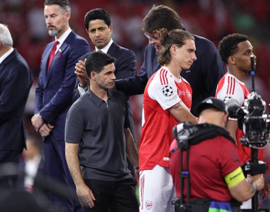 Budapest, Hungary, 30th May 2026. Mikel Arteta manager of Arsenal consoled during the Paris Saint Germain vs Arsenal UEFA Champions League Final match at Puskas Arena, Budapest. Picture credit should read: David Klein Sportimage EDITORIAL USE ONLY. No use with unauthorised audio, video, data, fixture lists, club league logos or live services. Online in-match use limited to 120 images, no video emulation. No use in betting, games or single club league player publications. SPI_155_DK_PSG_Arsenal SPI-4828-0154