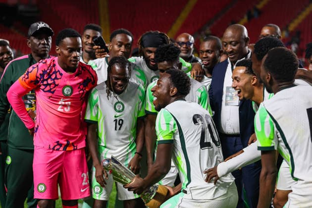Jamaica v Nigeria, Unity Cup London 2026, Cup Final Nigeria forward Philip Otele (20) lifts the Unity Cup Trophy after the Unity Cup London 2026 Final match between Jamaica and Nigeria at The Valley, London, UK on 30 May 2026. London The Valley Greater London UK Editorial use only , Copyright: xToyinxOshodix PSI-24348-0086