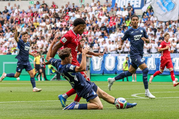 31.05.2026, xhettx, Fussball DM A-Junioren , TSG 1899 Hoffenheim - 1. FC Köln v.l. Maximilian Raphael Theuer (TSG Hoffenheim U19, 12) mit der grätsche gegen David Fürst (1 FC Köln U19, 2) (DFL DFB REGULATIONS PROHIBIT ANY USE OF PHOTOGRAPHS as IMAGE SEQUENCES and or QUASI-VIDEO)