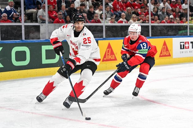 ZURICH, SWITZERLAND - MAY 31: Darnell Nurse of Canada L) protects the puck from Petter Vesterheim of Norway R) during the 2026 IIHF Ice hockey, Eishockey World Championship, WM, Weltmeisterschaft Switzerland Bronze medal game between Canada and Norway at Swiss Life Arena on May 31, 2026 in Zurich, Zurich. Zurich Swiss Life Arena Zurich Switzerland Copyright: xJustPictures.ch AndreaxBrancax jp-en-EuSpIm-JP7_ANB_CanNor_31052026_7613