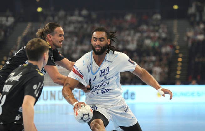 photo : Hugo Bryan MONTE dos SANTOS gegen Kent Robin Tönnesen Tonnesen (Flensburg) Handball Herren am So. 31.05.2026 Mens EHF European League , Final Four in Hamburg SG Flensburg - Montpellier HB Spiel um Platz 3