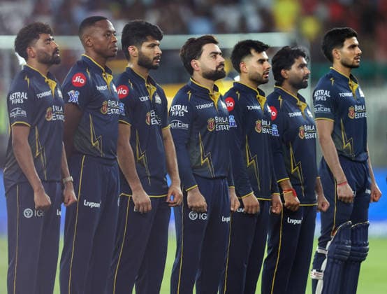 IPL 2026 Final, RCB vs GT Ahmedabad, May 31 (ANI): Gujarat Titans players stand for the national anthem before the Indian Premier League 2026 Final match against Royal Challengers Bengaluru at Narendra Modi Stadium, in Ahmedabad on Sunday. Ahmedabad Gujarat India Copyright: xANIx ANI_20260531335