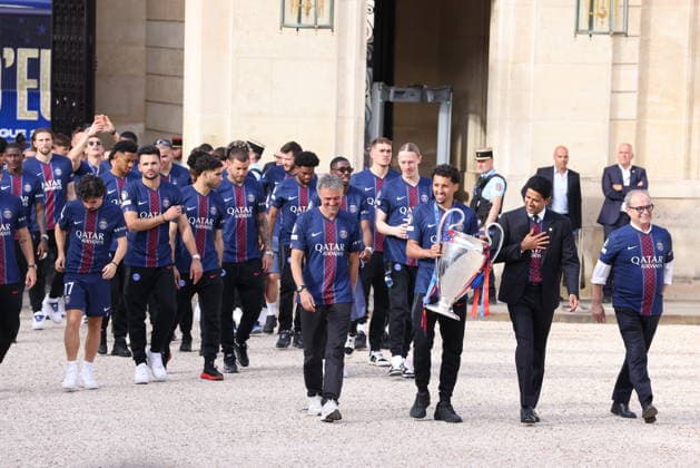 Ceremony at the Elysee for 2026 PSG UEFA Victory – Paris Captain Marquinhos carrying The Trophy with UEFA Champions League winner Paris Saint-Germain Team, , Spanish coach Luis Enrique and Qatari president Nasser al-Khelaifi arriving for a reception at the Elysee presidential palace in Paris, France on May 31, 2026, a day after PSG won the 2026 final football match against Arsenal in Budapest. Photo by Jerome Domine ABACAPRESS.COM Paris France  Copyright: xDominexJerome ABACAx
