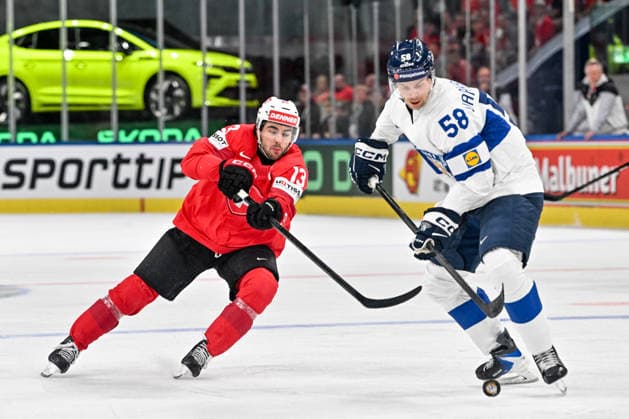 ZURICH, SWITZERLAND - MAY 31: Urho Vaakanainen of Finland R) protects the puck from Nico Hischier of Switzerland L) during the 2026 IIHF Ice hockey, Eishockey World Championship, WM, Weltmeisterschaft Switzerland Gold Medal game between Switzerland and Finland at Swiss Life Arena on May 31, 2026 in Zurich, Zurich. Zurich Swiss Life Arena Zurich Switzerland Copyright: xJustPictures.ch AndreaxBrancax jp-en-EuSpIm-JP7_ANB_SuiFin_31052026_8726